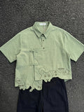 Asymmetric plaid shirt with frog closure and cat embroidery