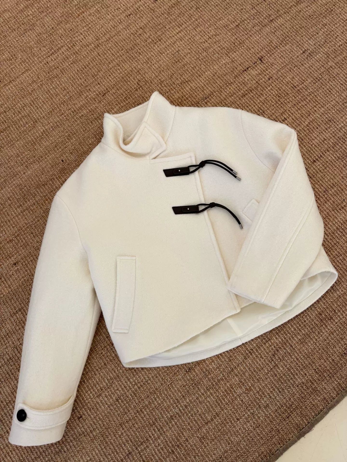 Cropped High-Neck Asymmetric Jacket with Toggle Closures
